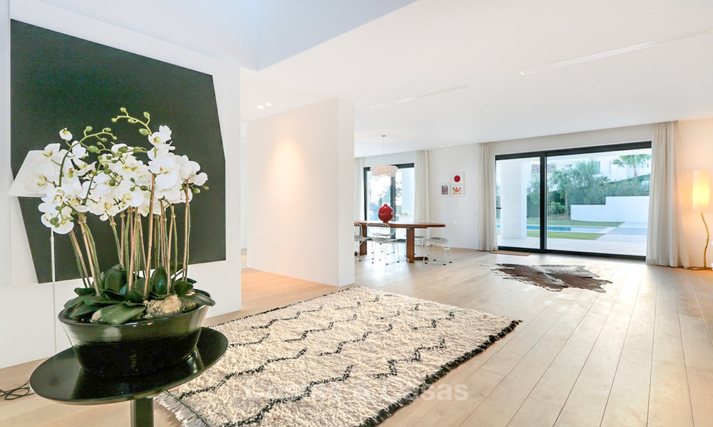 Dringende verkoop! Oogstrelende moderne luxe villa met golf- en zeezicht te koop, instapklaar - Benahavis, Marbella 9341