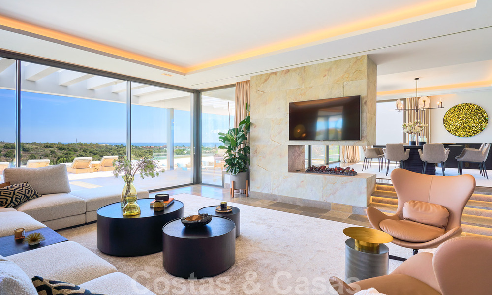 Spectaculaire eigentijdse luxe villa te koop, met prachtig zeezicht en een eerstelijns frontlinie golf positie in Benahavis - Marbella 36686
