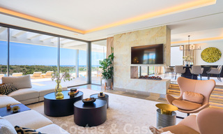 Spectaculaire eigentijdse luxe villa te koop, met prachtig zeezicht en een eerstelijns frontlinie golf positie in Benahavis - Marbella 36686 