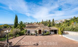 Traditioneel-mediterrane luxevilla te koop met zeezicht in een gated community op de Golden Mile van Marbella 54403 