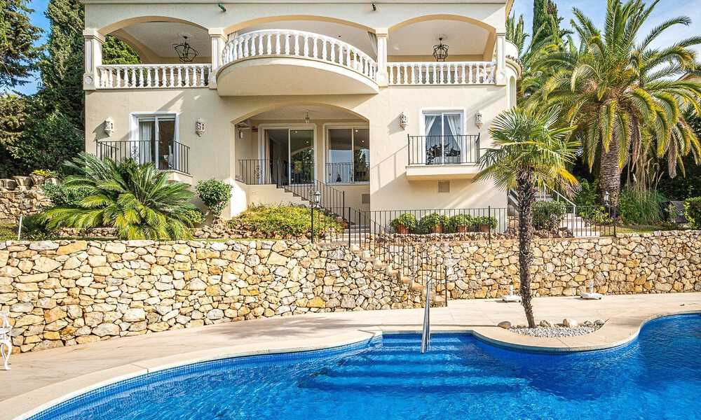 Traditioneel-mediterrane luxevilla te koop met zeezicht in een gated community op de Golden Mile van Marbella 54404