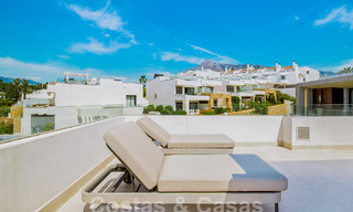 Moderne halfvrijstaande villa te koop, op loopafstand van Puente Romano op de Golden Mile van Marbella 52731 