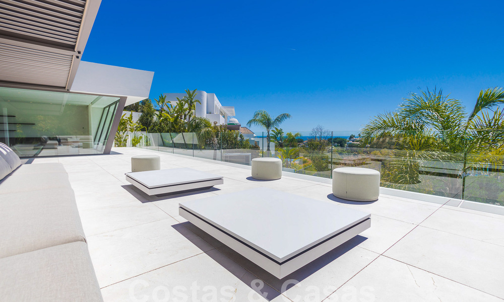 Instapklare, nieuwe, moderne luxevilla met 6 slaapkamers te koop met zeezicht in La Quinta, Marbella - Benahavis 54307