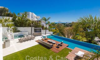 Instapklare, nieuwe, moderne luxevilla met 6 slaapkamers te koop met zeezicht in La Quinta, Marbella - Benahavis 54309 
