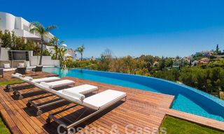 Instapklare, nieuwe, moderne luxevilla met 6 slaapkamers te koop met zeezicht in La Quinta, Marbella - Benahavis 54311 