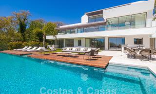 Instapklare, nieuwe, moderne luxevilla met 6 slaapkamers te koop met zeezicht in La Quinta, Marbella - Benahavis 54313 
