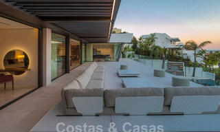 Instapklare, nieuwe, moderne luxevilla met 6 slaapkamers te koop met zeezicht in La Quinta, Marbella - Benahavis 54315 
