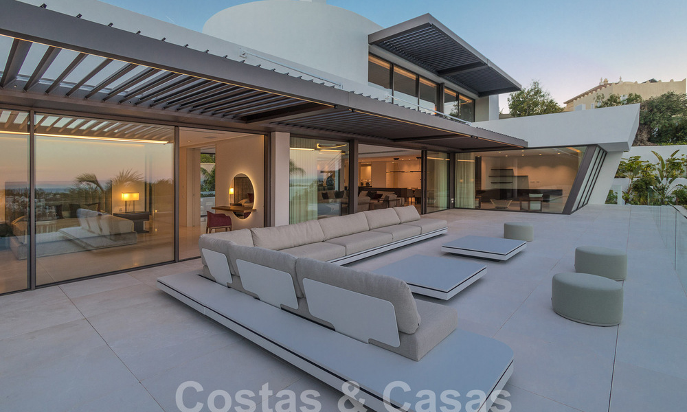 Instapklare, nieuwe, moderne luxevilla met 6 slaapkamers te koop met zeezicht in La Quinta, Marbella - Benahavis 54316