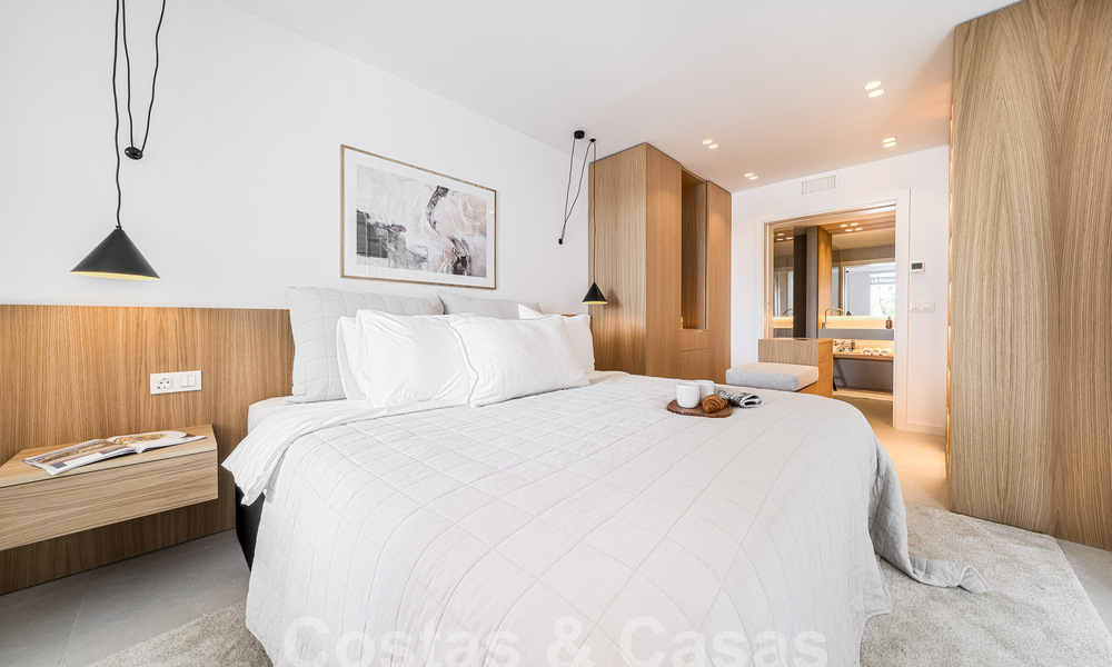 Luxueus appartement te koop met uitnodigend terras, privézwembad en zeezicht te Nueva Andalucia, Marbella 54942