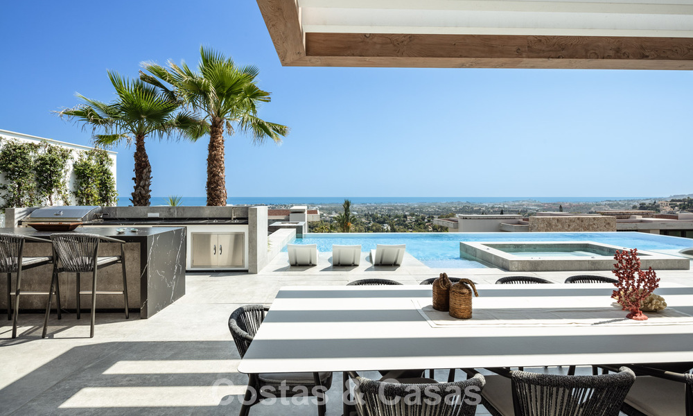 Verbluffende, architecturale luxevilla te koop met open zeezicht in een hoogstaande gated woonwijk in de heuvels van La Quinta in Marbella - Benahavis 54147