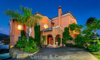 Prestigieuze luxevilla te koop in een klassieke Spaanse stijl met zeezicht in La Quinta in Marbella - Benahavis 56521 
