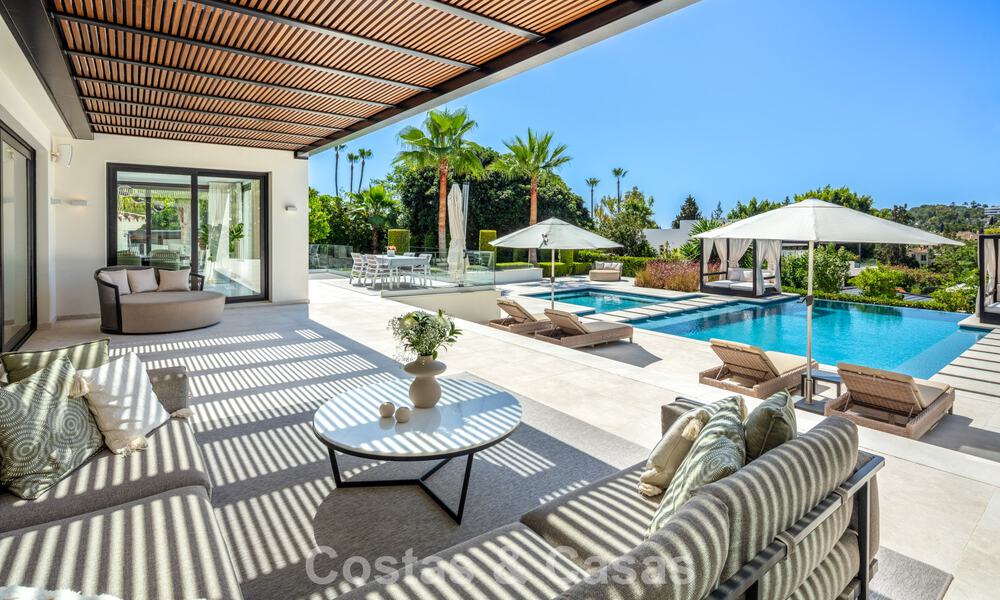 Moderne, symmetrische luxevilla te koop op een steenworp van de golfbanen van Nueva Andalucia’s vallei, Marbella 56183
