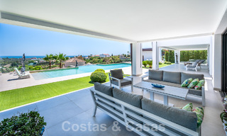 Moderne luxevilla te koop met zeezicht in een vijfsterren golfresort in Marbella - Benahavis 57597 