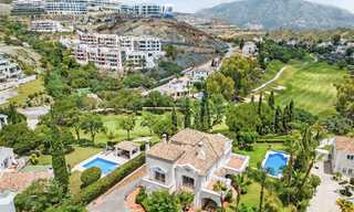 Luxevilla in een klassieke Spaanse stijl te koop in een gated golfresort van La Quinta, Marbella - Benahavis 58237 