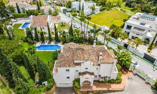 Luxevilla in een klassieke Spaanse stijl te koop in een gated golfresort van La Quinta, Marbella - Benahavis 58240 