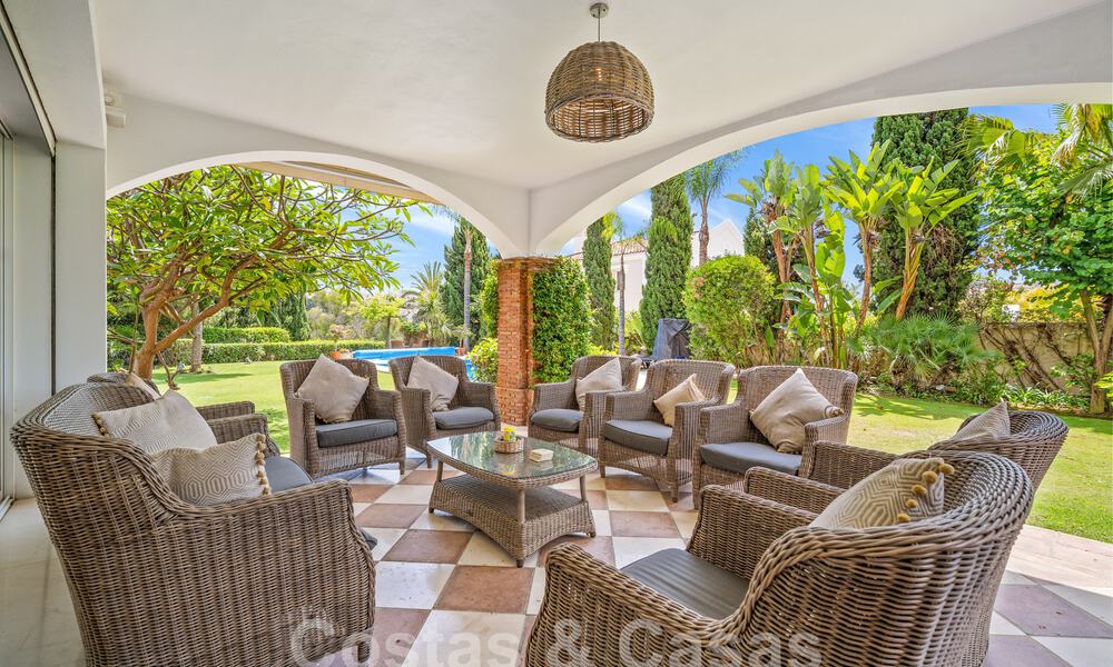 Luxevilla in een klassieke Spaanse stijl te koop in een gated golfresort van La Quinta, Marbella - Benahavis 58261
