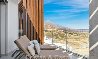 Gesofisticeerd nieuwbouwappartement te koop met fenomenaal uitzicht op zee, golf en berglandschap in Marbella - Benahavis 58368 