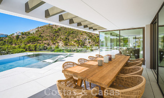 Luxueuze designervilla te koop in exclusief, gated frontlinie-golfcomplex met panoramisch uitzicht in La Quinta, Marbella - Benahavis 59068 