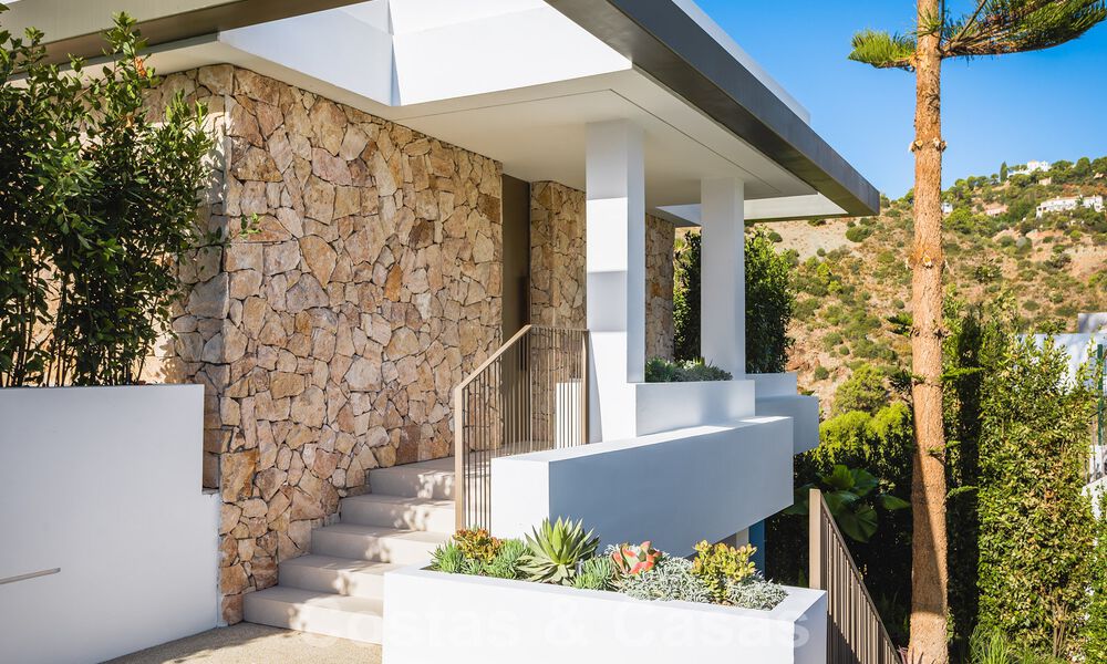 Luxueuze designervilla te koop in exclusief, gated frontlinie-golfcomplex met panoramisch uitzicht in La Quinta, Marbella - Benahavis 59078