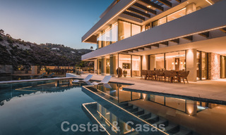 Luxueuze designervilla te koop in exclusief, gated frontlinie-golfcomplex met panoramisch uitzicht in La Quinta, Marbella - Benahavis 59100 