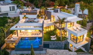Prestigieuze, moderne luxevilla te koop met adembenemend zeezicht in een gated community in Marbella - Benahavis 58697 