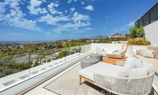 Prestigieuze, moderne luxevilla te koop met adembenemend zeezicht in een gated community in Marbella - Benahavis 58728 