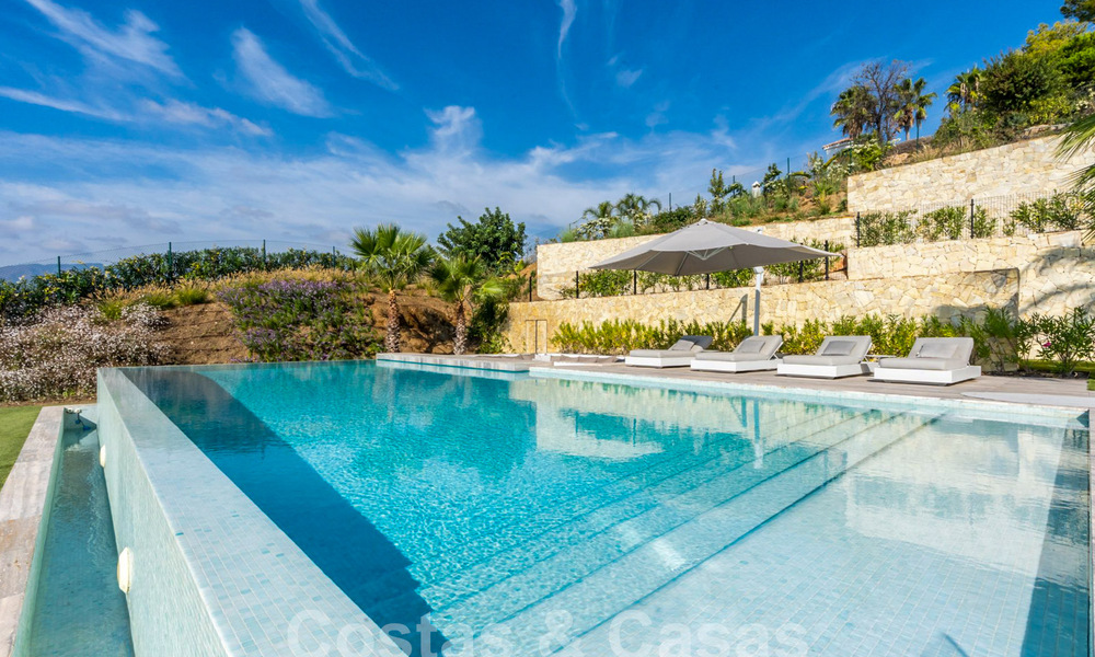 Moderne luxevilla te koop met zeezicht in een gated community omgeven door natuur in Marbella - Benahavis 59231