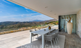 Moderne luxevilla te koop met zeezicht in een gated community omgeven door natuur in Marbella - Benahavis 59233 