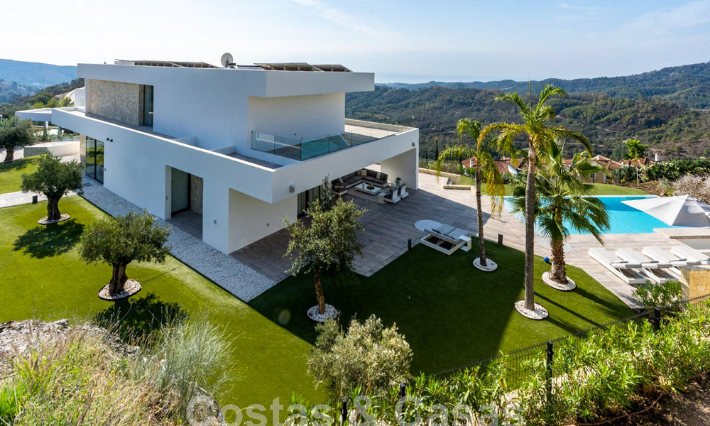 Moderne luxevilla te koop met zeezicht in een gated community omgeven door natuur in Marbella - Benahavis 59238