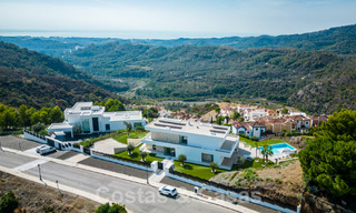 Moderne luxevilla te koop met zeezicht in een gated community omgeven door natuur in Marbella - Benahavis 59242 