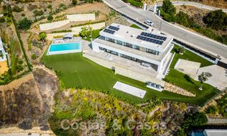 Moderne luxevilla te koop met zeezicht in een gated community omgeven door natuur in Marbella - Benahavis 59243 