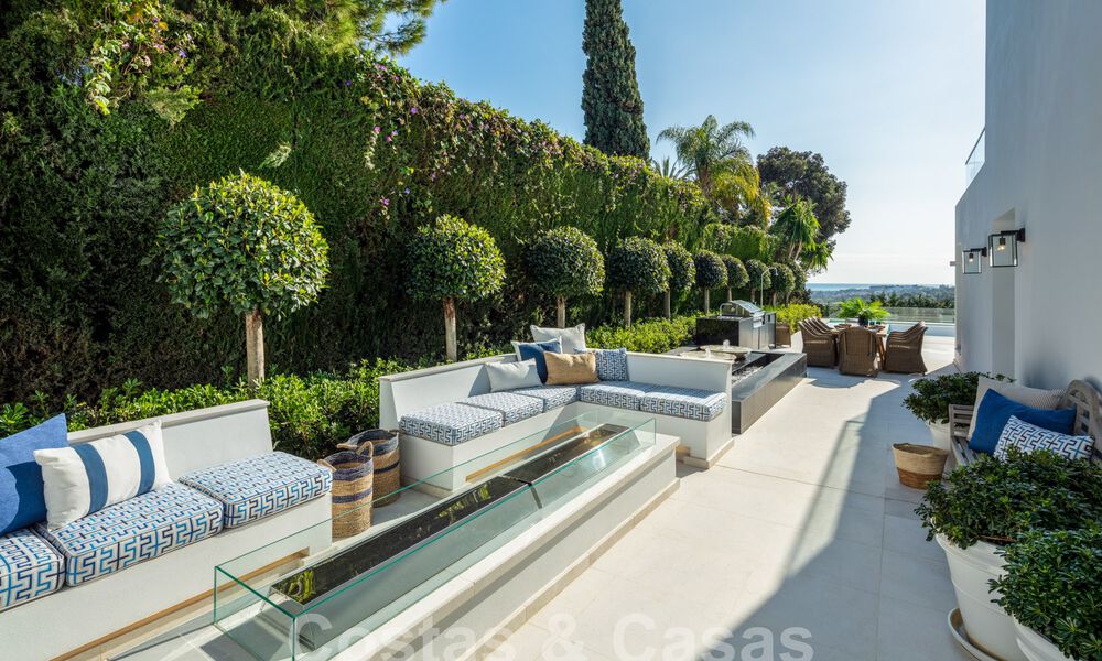 Spectaculaire luxevilla te koop in resort stijl met zeezicht in Nueva Andalucia’s golfvallei, Marbella 61085