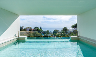 Instapklare, moderne luxevilla te koop met infinity zwembad in een exclusieve gated community in Benalmadena, Costa del Sol 64095 