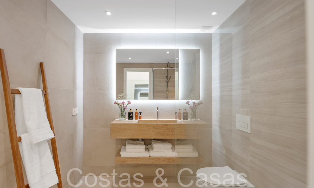 Verfijnd luxe appartement met meer-, berg- en zeezicht te koop in Nueva Andalucia, Marbella 64469