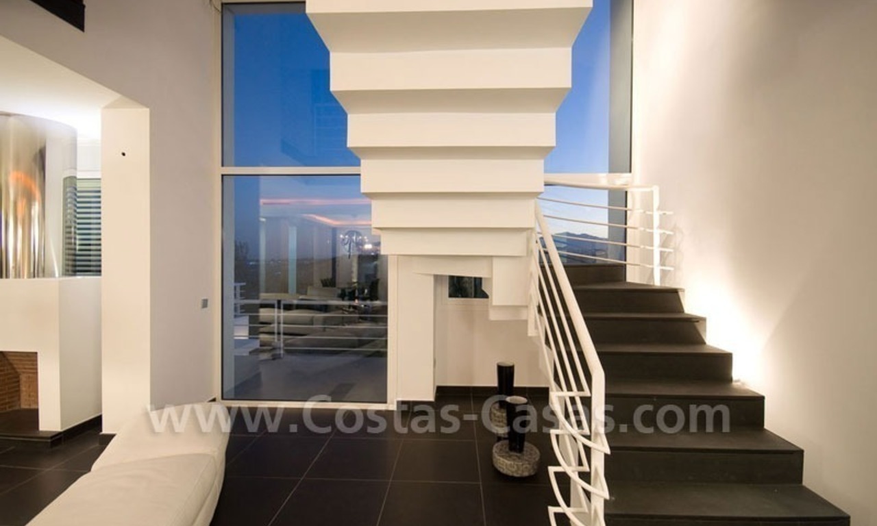 Moderne eerstelijngolf villa te koop in Nueva Andalucia te Marbella 12
