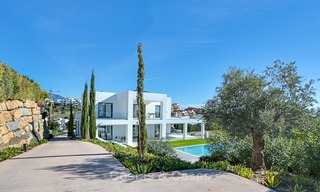 Dringende verkoop! Oogstrelende moderne luxe villa met golf- en zeezicht te koop, instapklaar - Benahavis, Marbella 9310 