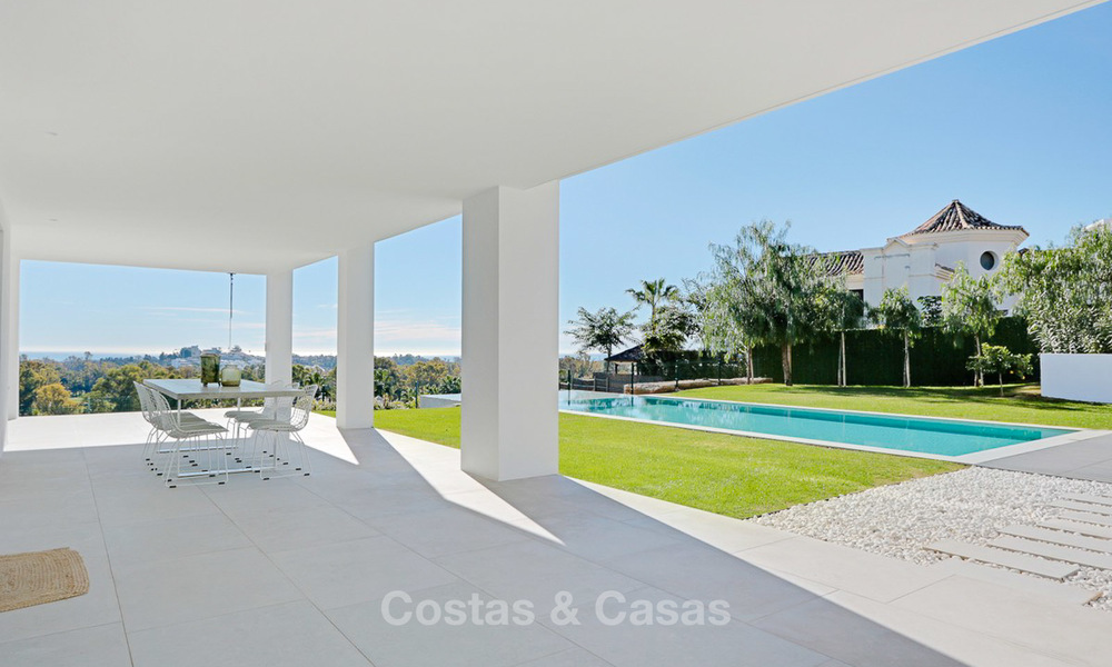 Dringende verkoop! Oogstrelende moderne luxe villa met golf- en zeezicht te koop, instapklaar - Benahavis, Marbella 9329