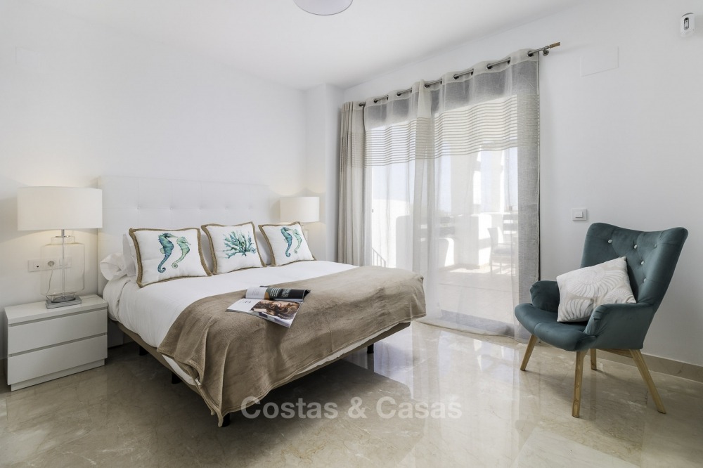 Nieuwe eerstelijns golf appartementen met zeezicht te koop, instapklaar, op loopafstand van het strand - Casares, Costa del Sol 11122