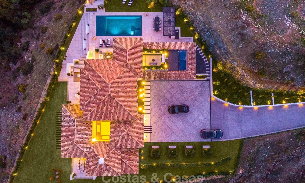 Oogstrelende, volledig gerenoveerde luxe villa met adembenemend zeezicht te koop in El Madroñal, Benahavis - Marbella 10091