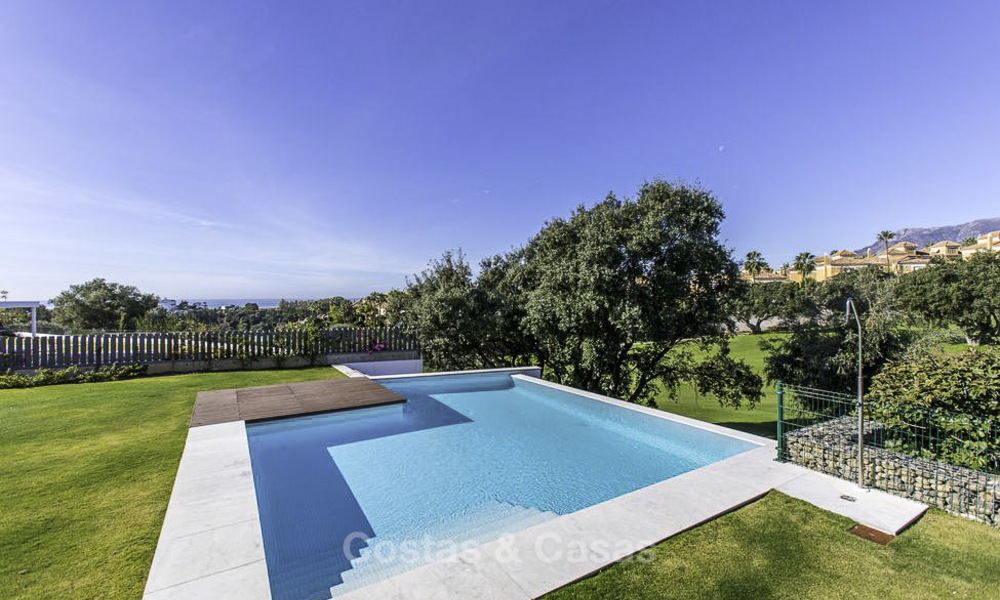Oogstrelende moderne designer villa met zeezicht te koop, eerstelijn golf en instapklaar, Oost- Marbella 11839
