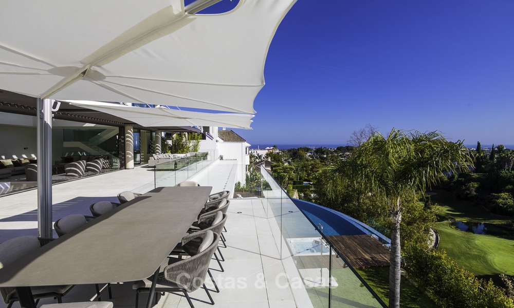 Gloednieuwe moderne luxe villa met golf en zeezicht te koop, instapklaar, in een golf resort in Nueva Andalucia, Marbella - Benahavis 13256