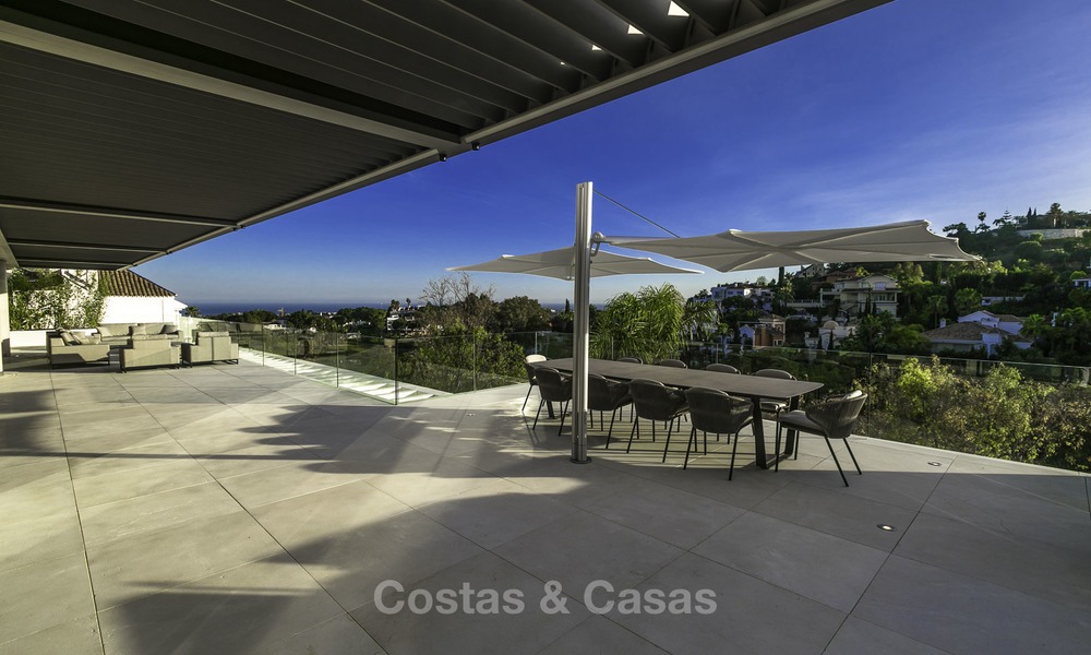 Gloednieuwe moderne luxe villa met golf en zeezicht te koop, instapklaar, in een golf resort in Nueva Andalucia, Marbella - Benahavis 13276