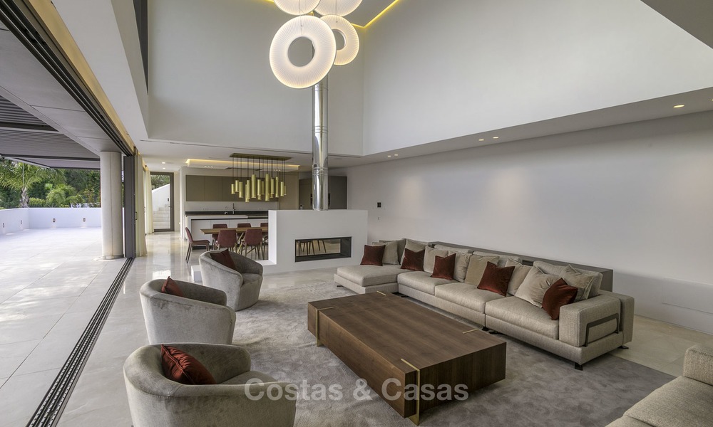 Gloednieuwe moderne luxe villa met golf en zeezicht te koop, instapklaar, in een golf resort in Nueva Andalucia, Marbella - Benahavis 13282
