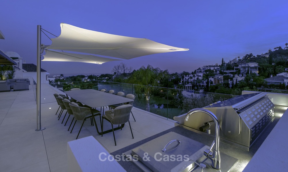 Gloednieuwe moderne luxe villa met golf en zeezicht te koop, instapklaar, in een golf resort in Nueva Andalucia, Marbella - Benahavis 13296