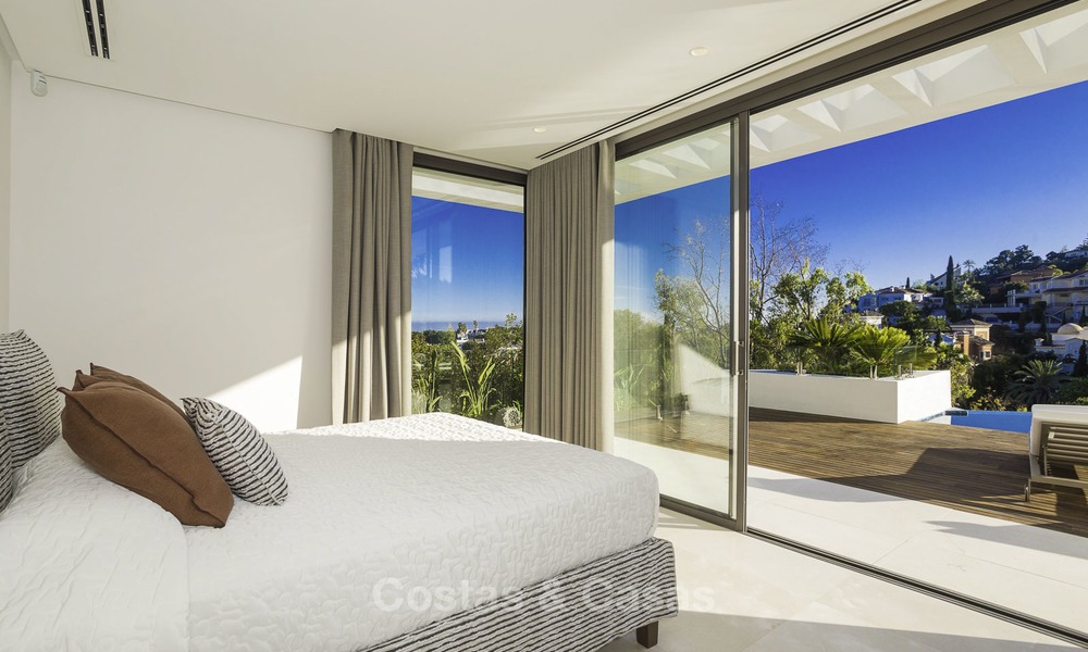 Gloednieuwe moderne luxe villa met golf en zeezicht te koop, instapklaar, in een golf resort in Nueva Andalucia, Marbella - Benahavis 13307