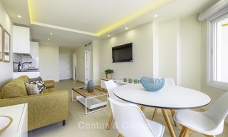 Volledig gerenoveerd appartement met panoramisch zeezicht te koop, direct aan het strand, Mijas Costa 14658 