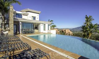 Prachtige modern-Andalusische villa met spectaculair panoramisch zeezicht te koop in Oost-Marbella 14787 