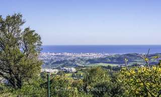 Prachtige modern-Andalusische villa met spectaculair panoramisch zeezicht te koop in Oost-Marbella 14791 