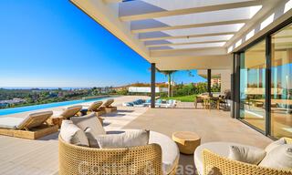 Spectaculaire eigentijdse luxe villa te koop, met prachtig zeezicht en een eerstelijns frontlinie golf positie in Benahavis - Marbella 36663 
