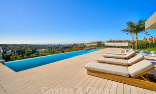 Spectaculaire eigentijdse luxe villa te koop, met prachtig zeezicht en een eerstelijns frontlinie golf positie in Benahavis - Marbella 36664 